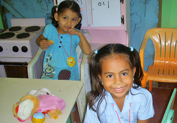 School girls playing in renovated play area