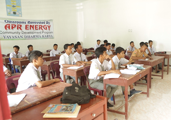 Indonesian students studying in their renovated classroom