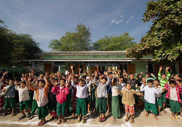 Burmese children celebrating their school renovations