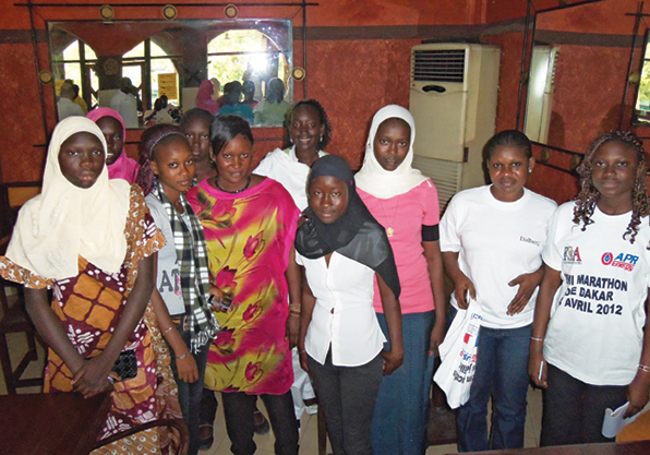 Young Senegalese female students at half marathon race